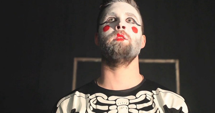 A still from the season 1 episode 5, featuring Greg in Kabuki makeup on stage during his one-man show